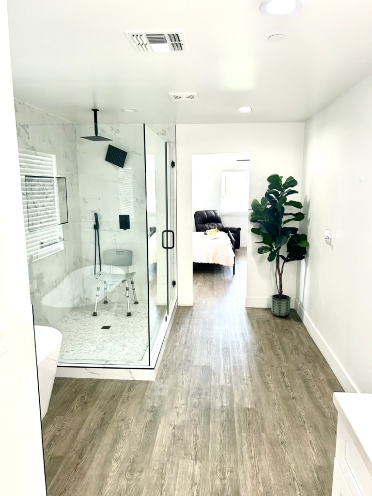 Walk-in shower with grab bars